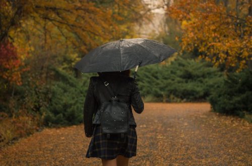 Woman walking in the rain.