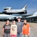 Family in front of NASA jets.